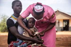 Wasting away: Natural disasters and raids by heavily-armed cattle thieves have left little to eat. By Badru KATUMBA AFP