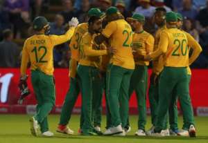 Well bowled - South Africa's Tabraiz Shamsi C is congratulated by teammates after his dismissal of England's Sam Curran. By Geoff Caddick AFP