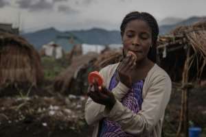 Women dependents in the camp have to make do. By Guerchom NDEBO AFP