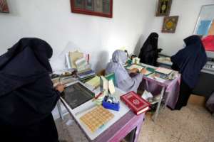 Women have increasingly become involved in the restoration of Korans in Libya, even holding training workshops to teach blind women how to restore copies. By Mahmud Turkia AFP