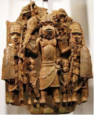 Warrior flanked by two shield bearers, Benin, Nigeria, now in British Museum, London.