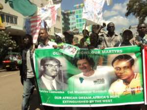 Youths in Kenya protest the murder of Muammar Gaddafi by NATO