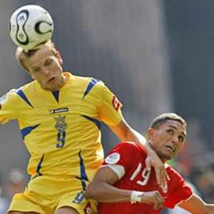 Ukraine's Oleg Gusev beats Tunisia's Anis Ayari in the air