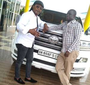 Nana Acheampong left in a pose with Dr. S.K Boafo