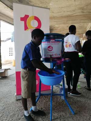 Volunteers Educate Students On Correct Hand Washing Technique