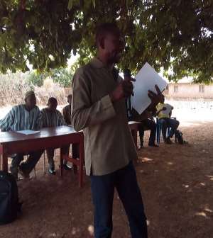 Abdul Rahaman Osman - the Daffima Bussie Issa District Director of NCCE addressing the gathering