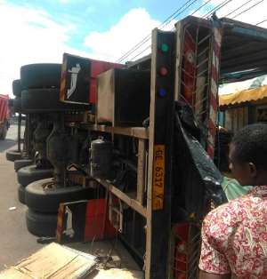 The Burkina Faso-bound truck lying on its side