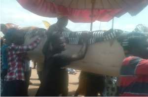 The paramount Chief of Badu Traditional Area,Nana Boakye Yiadom II in a palanquin