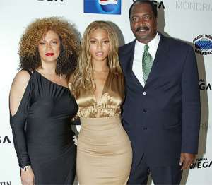 Beyonce with her mom and dad