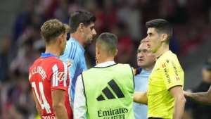 Getty ImagesImage caption: Real Madrid keeper Thibaut Courtois complained of objects being thrown, leading to the games suspension