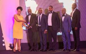 The GCNet team receiving one of the awards from Dr. Ayorkor Korsah at the maiden Mobex Innovation Awards