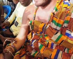 The enstoolment of white people in Ghana as Nkosuahene - welfare chiefs, portrays Ghana a cheap country, lazy people, and lowers the esteem of Ghanaians. Photo credit: Ghana media