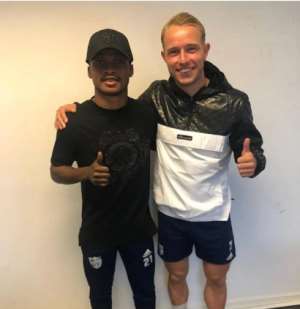 Emmanuel Toku Left, Pierre Larsen Right