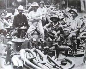 British soldiers of the infamous Punitive Expedition of 1897 proudly posing with looted Benin artefacts.