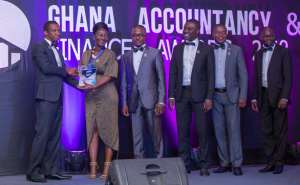 HR Manager of GCNet, Mrs. Akosua Asamoah receiving one of the awards at the 2nd Ghana Accountancy and Finance Awards.