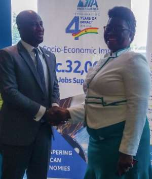 Clarence Nortey, Country Director of IIA and Mrs Grace Anim-Yeboah, Director of Business Banking of Barclays Ghana