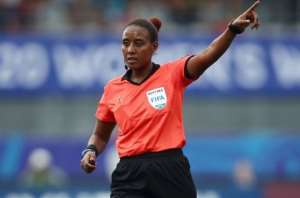 VANNES, FRANCE - AUGUST 08: Referee Lidya Tafesse Abebe reacts next to Selma Bacha of France during the FIFA U-20 Women's World Cup France 2018 group A match between France and New Zealand at Stade de la Rabine on August 8, 2018 in Vannes, France. Photo by Alex Grimm - FIFAFIFA via Getty Images