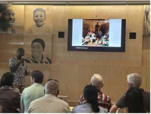 Mac sharing his journey and work with the public at the Gates Foundation’s Discovery Center in Seattle
