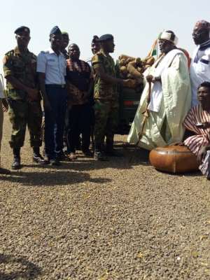 Police And Soldiers Receive Yam From KAFAFA