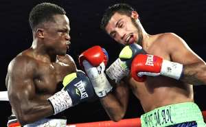 Isaac Dogboe left knocked out Chris Avalos in eight rounds