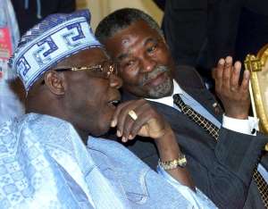 Former presidents Olusegun Obasanjo and Thabo Mbeki share a light moment at a meeting of the G8 and developing nations in Tokyo in 2000. - Source: EFE-EPAMichel Euler