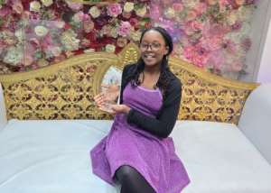 Sarah Kittoe displaying her Special Recognition award at the Royal Global Awards 2024