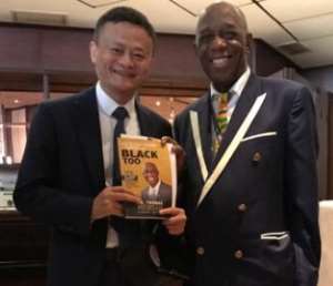 Dr. Thomas Mensah Presents 'The Right Stuff Comes in Black Too' Book To Jack Ma