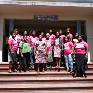 WR: Group Of Health Workers Support Breast Cancer Patient