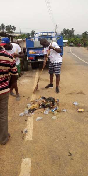 Jomoro MP, Hon. Paul Essien in action cleaning the streets