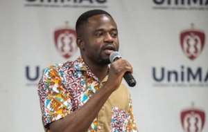 Investigative journalist and author Manasseh Azure Awuni