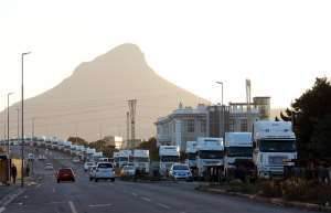 Trucks lining outside a container yard in Cape Town, South Africa. Infrastructure backlogs are a threat to food exports. - Source: Photo by Nardus EngelbrechtGallo Images via Getty Images