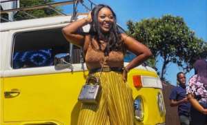 Actress, Jackie Appiah Steps out in Matching Out with Commercial Bus