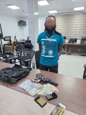 Police Arrest man with suspected counterfeit dollars, gun at Ablekuma