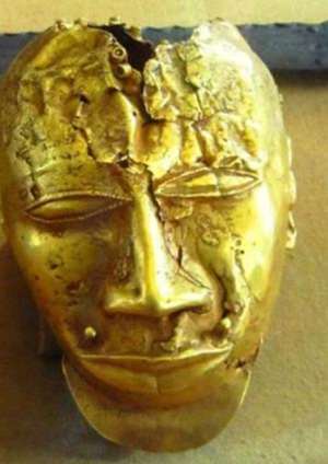 Gold mask, 20 cm in height, weighing 1.36 kg of pure gold, seized by the British from Kumasi, Ghana, in 1874 and now in the Wallace Collection, London, United Kingdom.