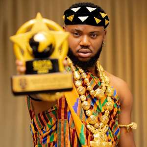 Somadina Adinma receives the Supreme African Child Prodigy turned Film Star of the Year award at the SDTA Awards Gala in Accra, Ghana.