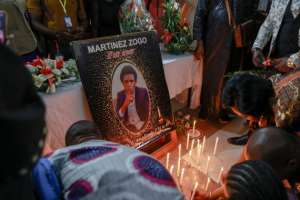 A memorial is seen for Amplitude FM journalist Martinez Zogo in Yaounde, Cameroon, on January 23, 2023. Zogo went missing on January 17 and was found dead on Sunday. AFPDaniel Beloumou Olomo