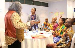 Training and mentoring in Addis Ababa, Ethiopia Rhoda standing January 2020