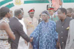 Kufuor Honours Obasanjo