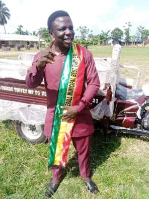 Jomoro MP handover tricycle to overall Municipal Best Farmer