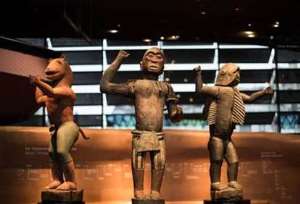 Royal statues, Dahomey, Republic of Benin, previously in Muse du Quai Branly, Paris, that France returned to the Republic of Benin. Left, King Gll, half-lion, half-man. Centre, King Ghzo, half-bird, half-man. Right, King Bhanzin, half-shark, half-man.