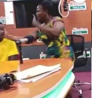 Angry wife slaps husband on live radio show