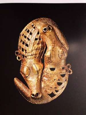 Gold jewel of two crocodiles, Akan, Baule, Ivory Coast, now in Muse du Quai Branly, Paris, France.