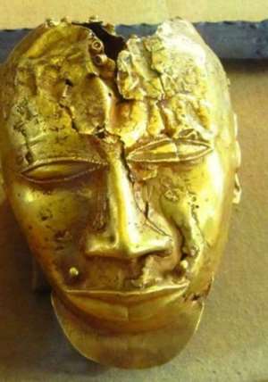 Gold mask, 20 cm in height, weighing 1.36 kg. of pure gold, seized by the British from Kumase, Ghana, in 1874 and now in the Wallace Collection, London, United Kingdom.