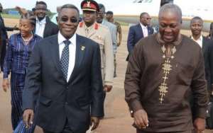 Late President John Evans Atta Millsleft and Mr. John Dramani Mahama