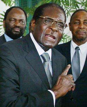 IN AWE OF MUGABE