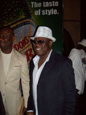 CEO OF KENNIS MUSIC ON THE RIGHT