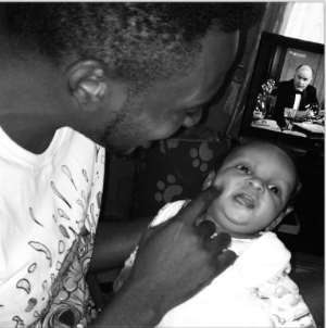 May D Shows Off 2-Month-Old Son