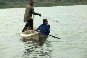 A Child Working On Lake Volta. Photo Taken By Eric Peasah