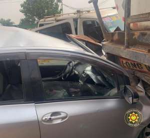 Petrol tanker failed to climb steep road and rolled backward on vehicles behind it