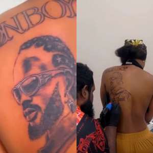 Female fan with Black Sheriffs tattoo at her back